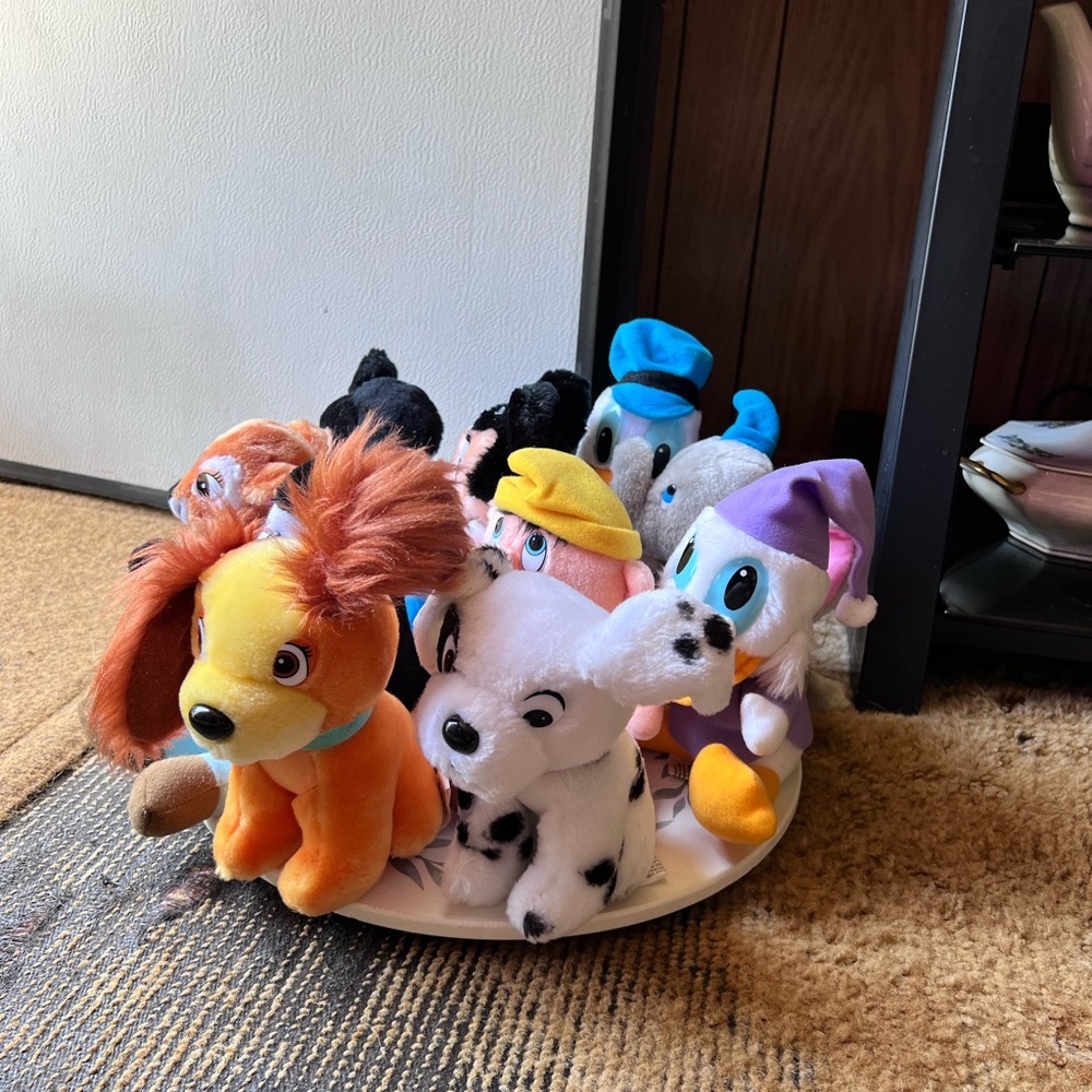 Set of 10 vintage Walt Disney plush figurines.